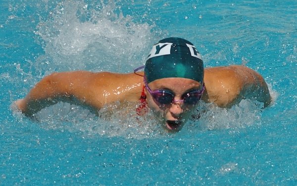 Senior Jayna Wittenbrink wins the girls’ 100 fly with a time of 56:42 at the De Anza Division Championships last season. 