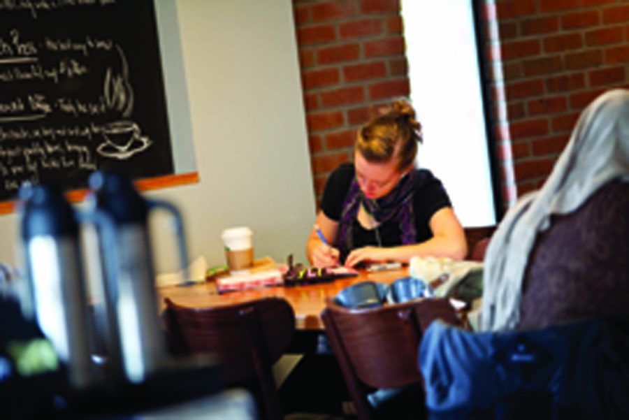 Students embrace the chill vibe at Starbucks by ordering a signature drink and hitting the books.