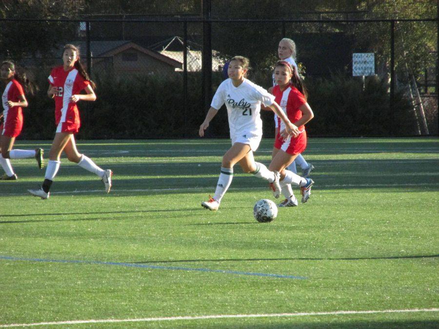 Sophomore Allison Lu dribbles the ball in a recent home game against Saratoga High School. The Vikings won this game 3-0 to improve to 2-0 in league.