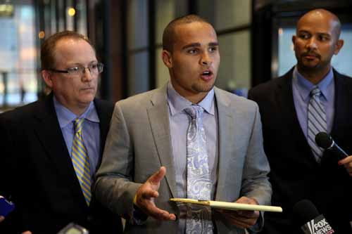 Kain Colter, a Northwestern University football player, addresses the media after presenting to the National Labor Relations Board.