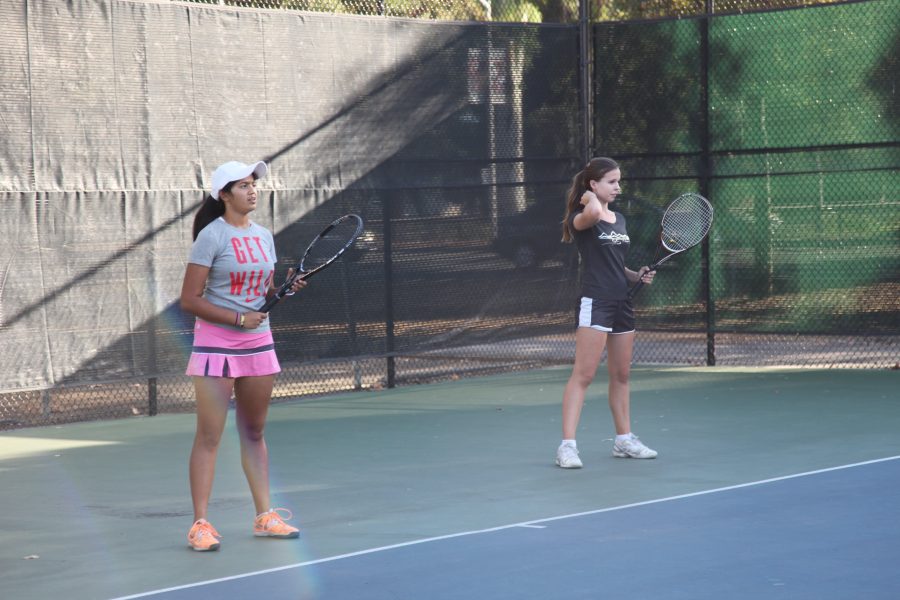 Paly girls tennis player practice. 
