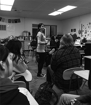 Alumna Gunita Singh explains factory farming to a Paly Living Skills class to raise awareness about its effects on the environment. 