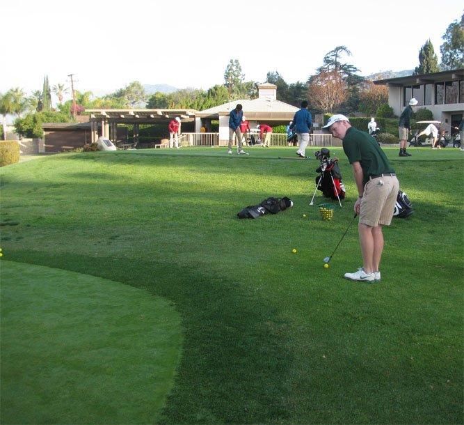 Junior Henry Gordon prepares for an upcoming tournament by practicing his swing at the Glendora Country Club in Pasadena.