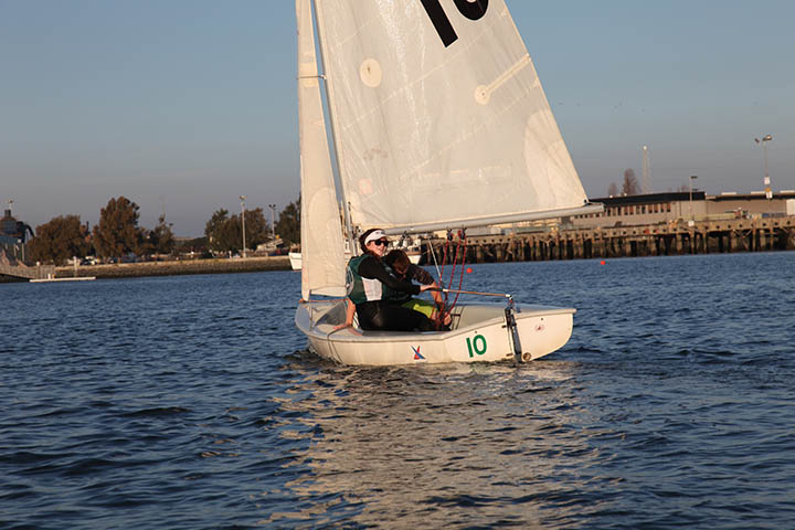 Paly sailing team members Maeve Lavelle and Sean Jawetz enjoy the waters at the Port of Redwood City in their sailing boat as they practice together for an upcoming event. 