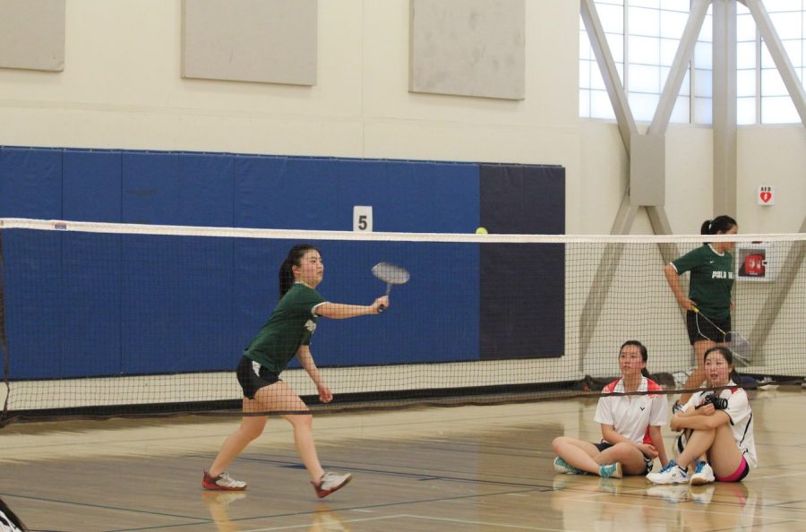 Junior Helen Yan attempts to return the serve in a game against Lynbrook High School. The Vikings fell to Lynbrook 27-3.