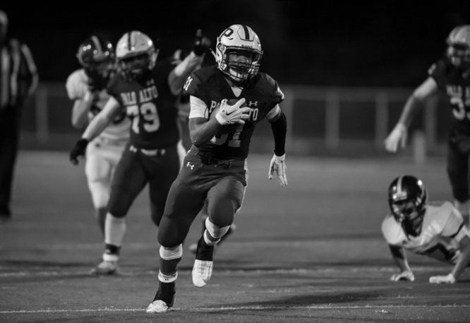 Sophomore Paul Jackson III runs for a touchdown in the game against Homestead High School. The Vikings went on to win 45-7.