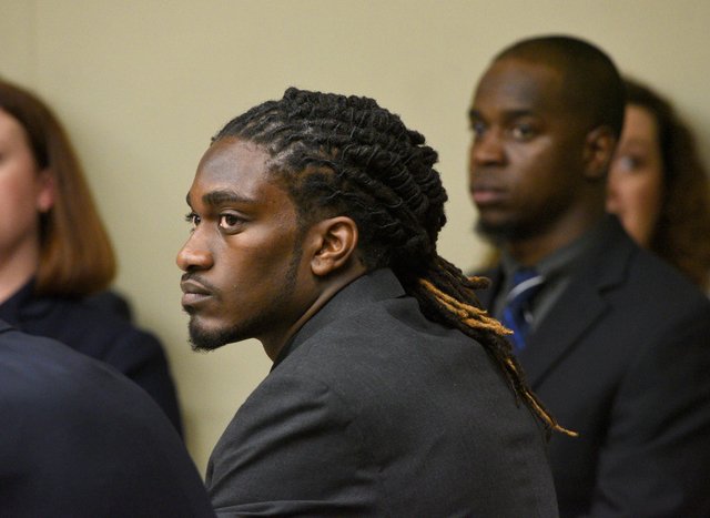 A.J. Johnson, center, and former teammate Michael Williams appeared in Knox County Criminal Court Thursday, Jul. 30, 2015 for a motions hearing where each is charged with four counts of aggravated rape.  (MICHAEL PATRICK/NEWS SENTINEL)