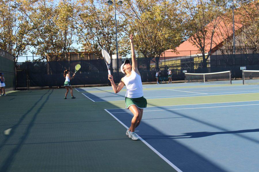 Girls tennis claims first place in league