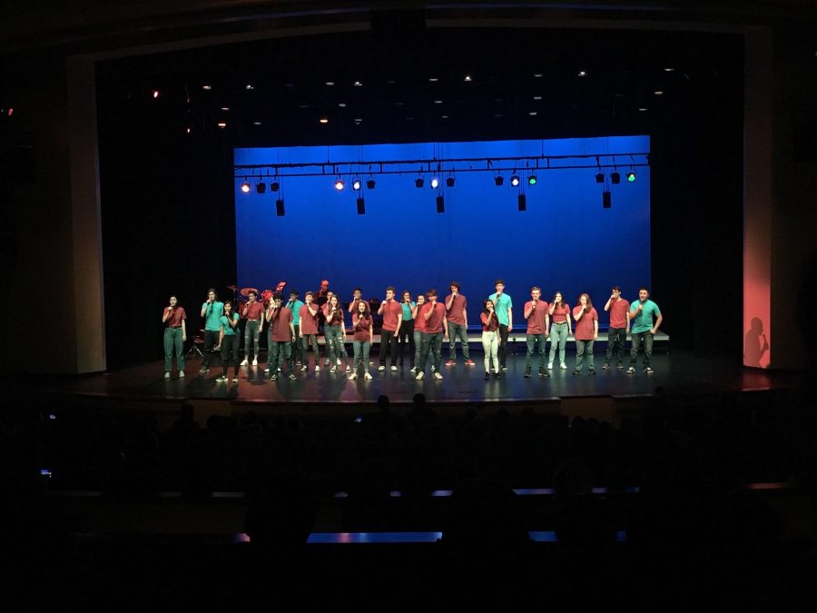 The+Paly+Premier+Choir+students+perform+an+ensemble+piece+rendition+of+the+song+%E2%80%9CBeautiful+Day%E2%80%9D+by+U2.