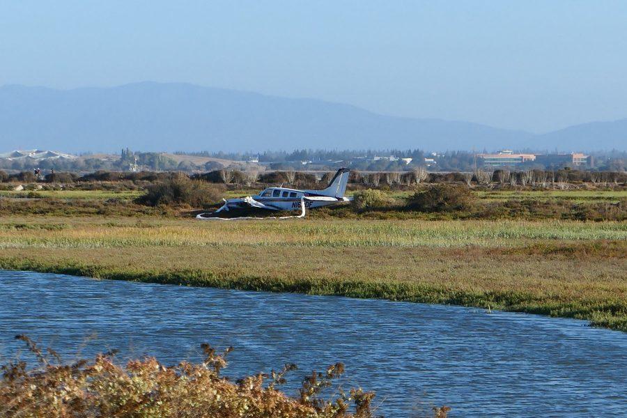 Twin-engine Beechcraft Baron 58P rests in the marshes of the Baylands after crashing there Monday afternoon. Photo by Cayden Gu