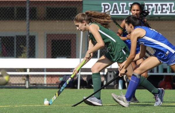 Senior Hailey Kliner dribbles away from an opponent. “We did really well at our first game,” Kleiner said. “Everyone made sure to stay with the ball even when
we lost it, so I’m really optimistic that we’re going to improve a lot with each game.”