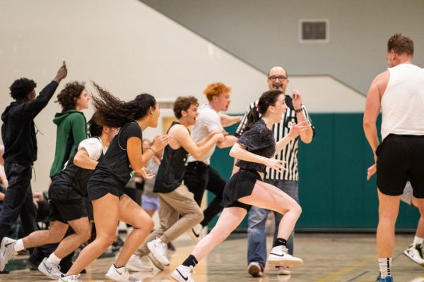 Full of energy, seniors run onto the court after a close victory against staff. “I didn’t expect (my last shot) to go in, but as soon as it did, I (went) crazy,” Vetter said.