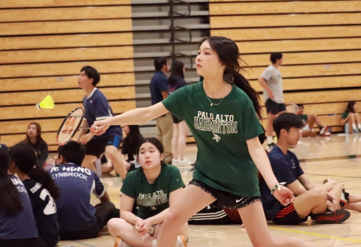 Senior and captain Hannah Fung returns the shuttlecock over the net. “These past three years (of) badminton seasons have always been one of the most special times of year for me, so I’m kind of sad to see the season go,” Fung said.