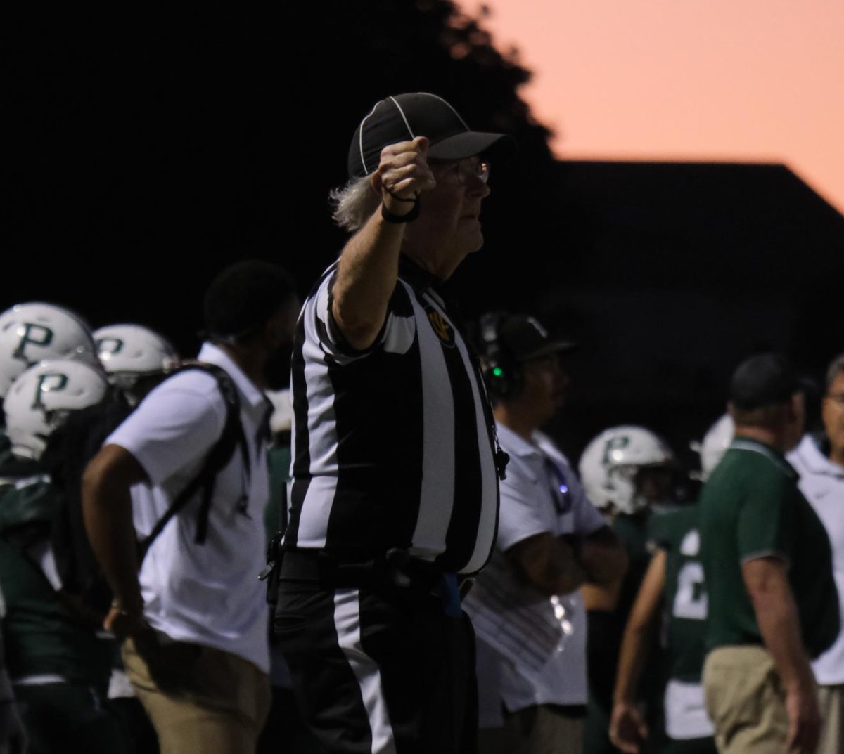 Mac Parfet, an official for Northern California Football Officials Associations, makes a call. “I enjoy getting on the field and running,” Parfet said. 