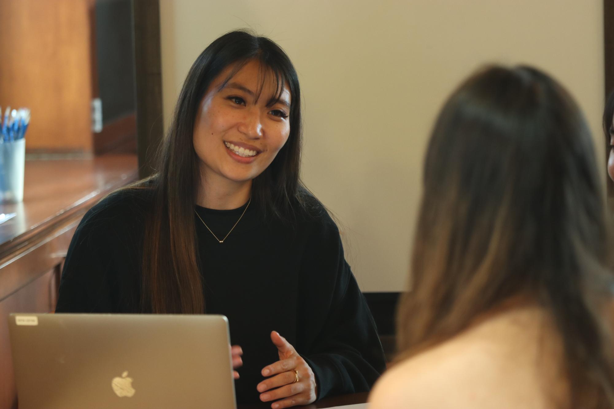 Paly teacher Young-Ju Lee interviews a tutor candidate at the Tower Learning Center. “We don’t want them to depend on the TLC,” Lee said. “We want them to figure out, ‘Hey, I’ve built these skills, I’ve developed these skills.’”