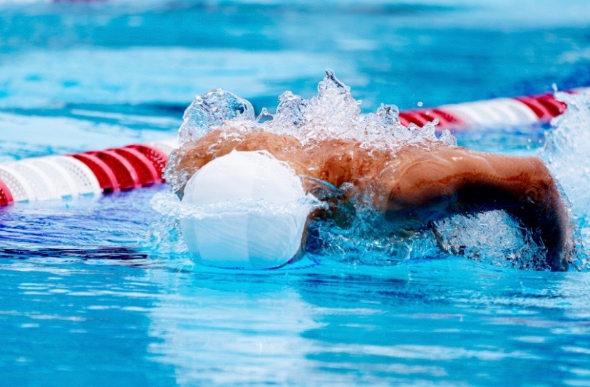 Senior Nicolas Ogawa races across the pool with his butterfly. “I like swimming because I love practicing every day to try to improve,” Ogawa said. “It almost feels like an art because we can spend hours trying to improve the smallest things such as hand potion or body angle just to go hundredths of a second faster.”