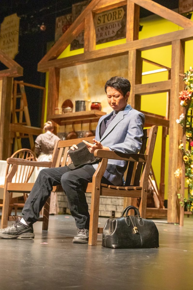 Junior Brendan Giang plays Dr. Gibbs in Paly’s production of “Our Town.” “Theater is about a community of people coming together to create an experience,” Giang said.