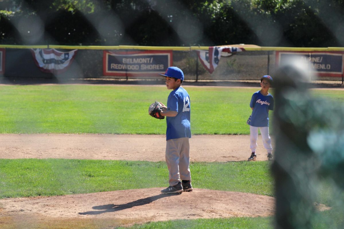 A Little League player prepares to pitch in a fall ball game at
Middlefield Ballpark on Oct. 4. Supporters of Palo Alto Little
League are in the middle of a campaign to raise $5 million to
upgrade the program’s 75-year old facilities. 