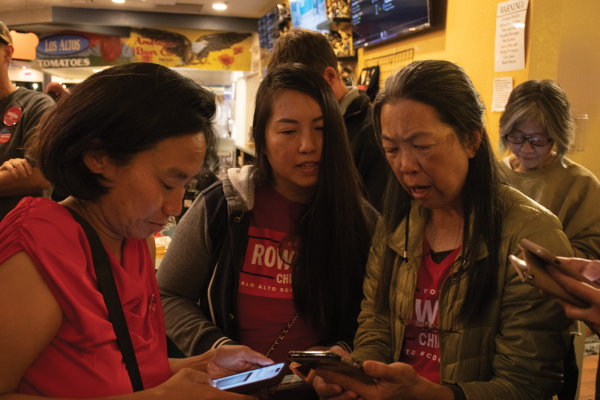 Rowena Chiu (left) and her supporters gather at State of Mind in Los Altos to watch the live election results at Chiu’s watch party. “She’s genuine,” Chiu’s campaign manager Ginnie Noh said. “She is the smartest person I’ve ever met.”