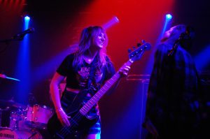 Kalena Masching plays bass with her band, the Doll Parts. “I went to Paly,” Masching said. “I know what it feels like to not be the one going to the four-year college. My life is awesome.”