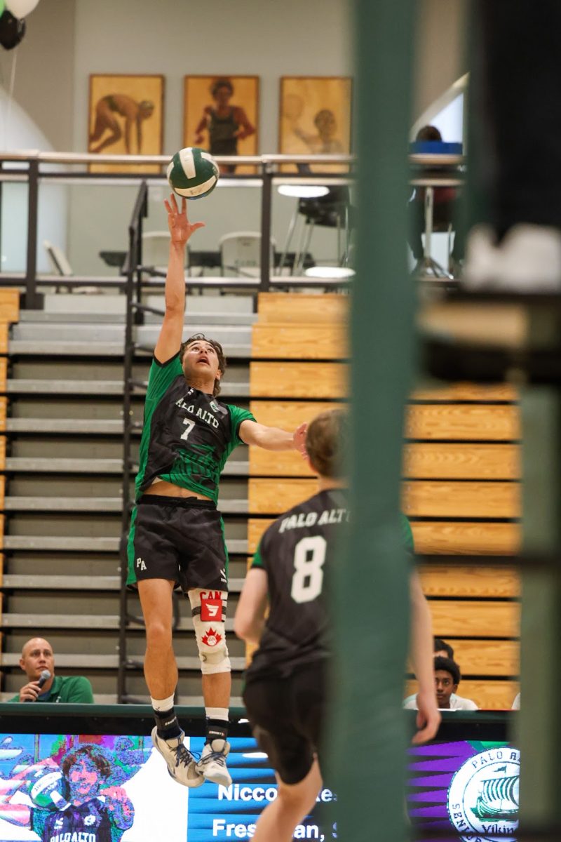 Senior Giacomo Resmimi delivers a smash.