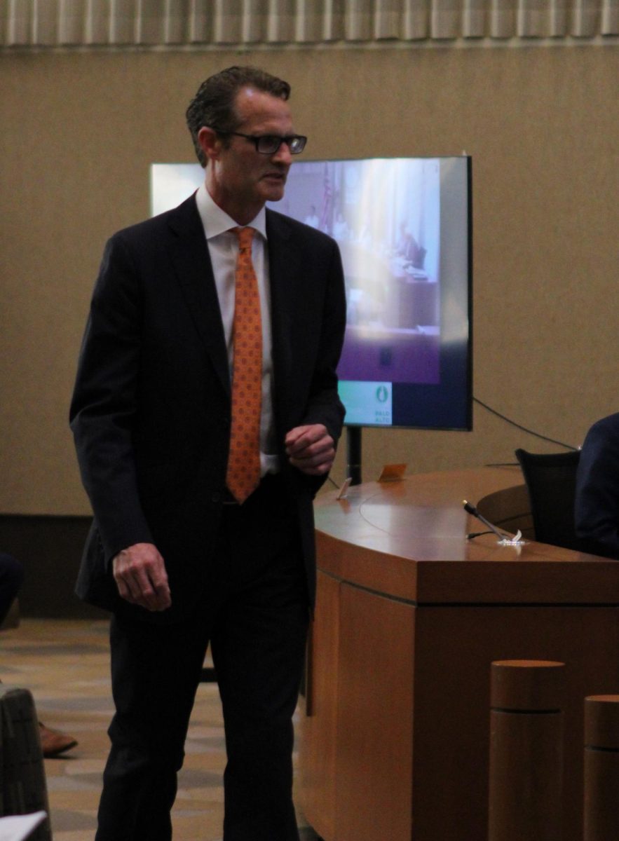 Chris Jensen walks up to the podium to thank the council members for approving him as city attorney during the City Hall meeting on March 16. "I think the council has a lot of interesting ideas, and I hope to be able to support them," Jensen said. 